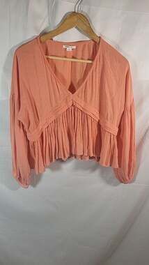 O'Neill Mary Solid Long Sleeve Peplum Top in Peach, M